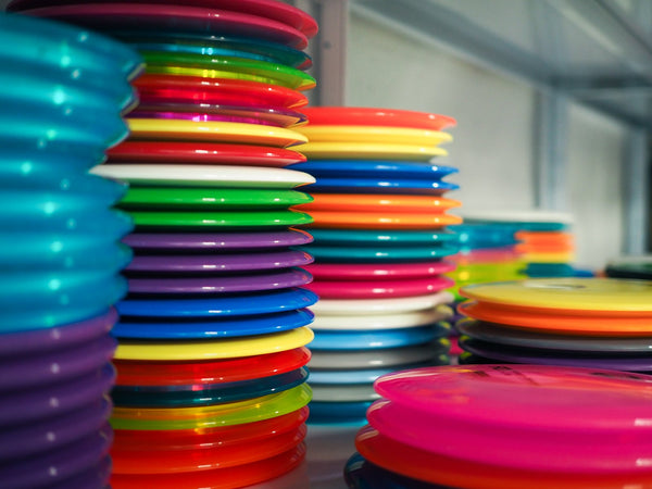Disc golf discs on the shelf at the DiscKing store