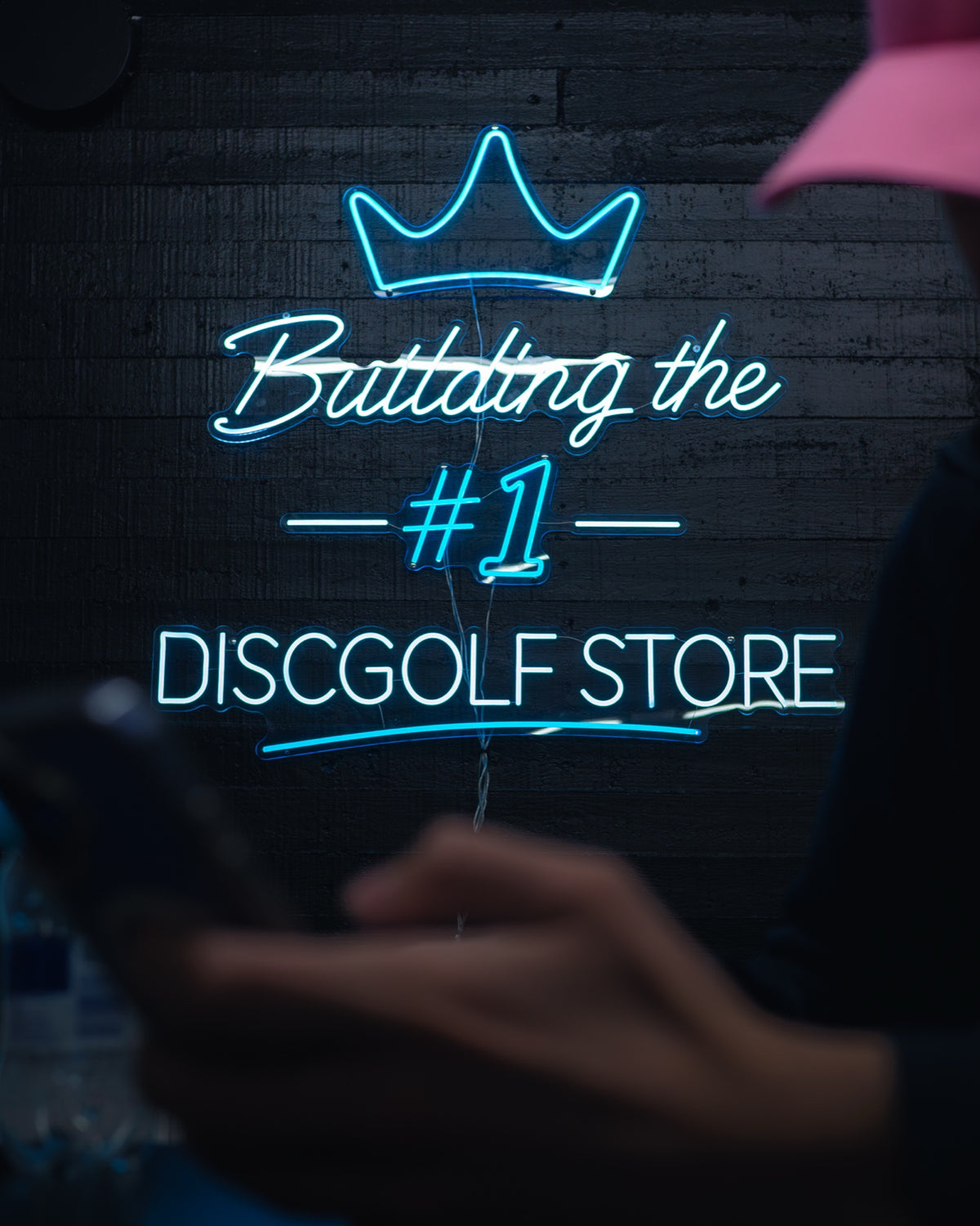 Building the #1 disc golf store neon sign in the DiscKing store